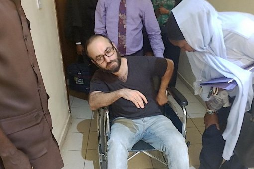 Гамбарян в суде в инвалидной коляске. Источник: Nairametrics.